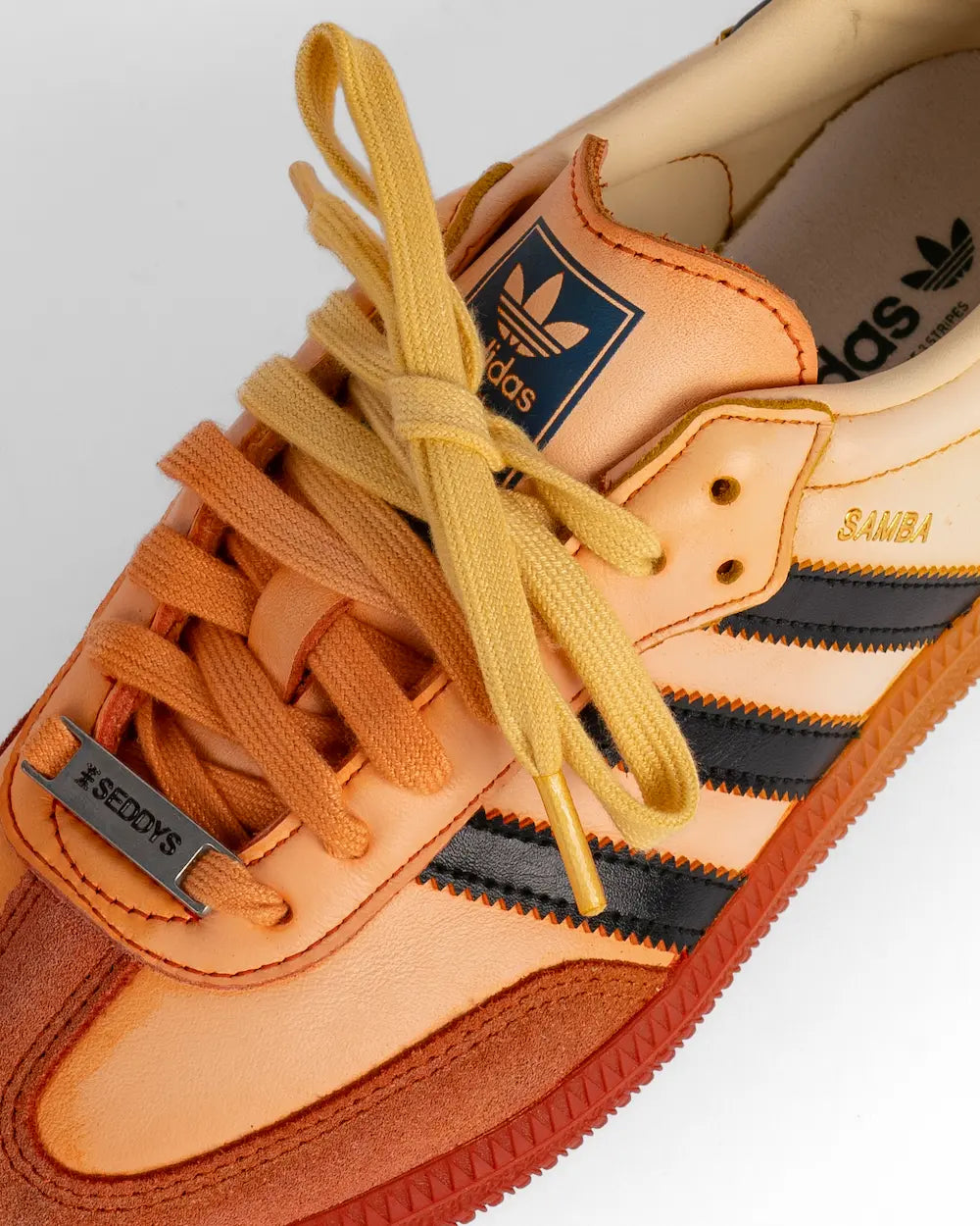 Adidas superstar homme orange sales